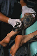 Jack is getting a tattoo on his leg