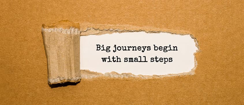 Photo of a quote: "Big journeys begin with small steps"