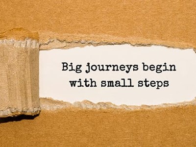 Photo of a quote: "Big journeys begin with small steps"