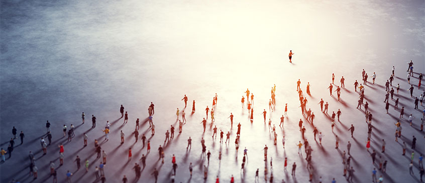 Illustration of a person leading a crowd