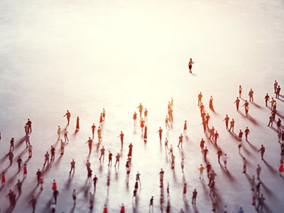Illustration of a person leading a crowd
