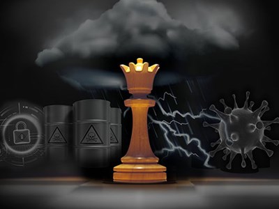 Chess piece with illustrations of various disasters in the background. 