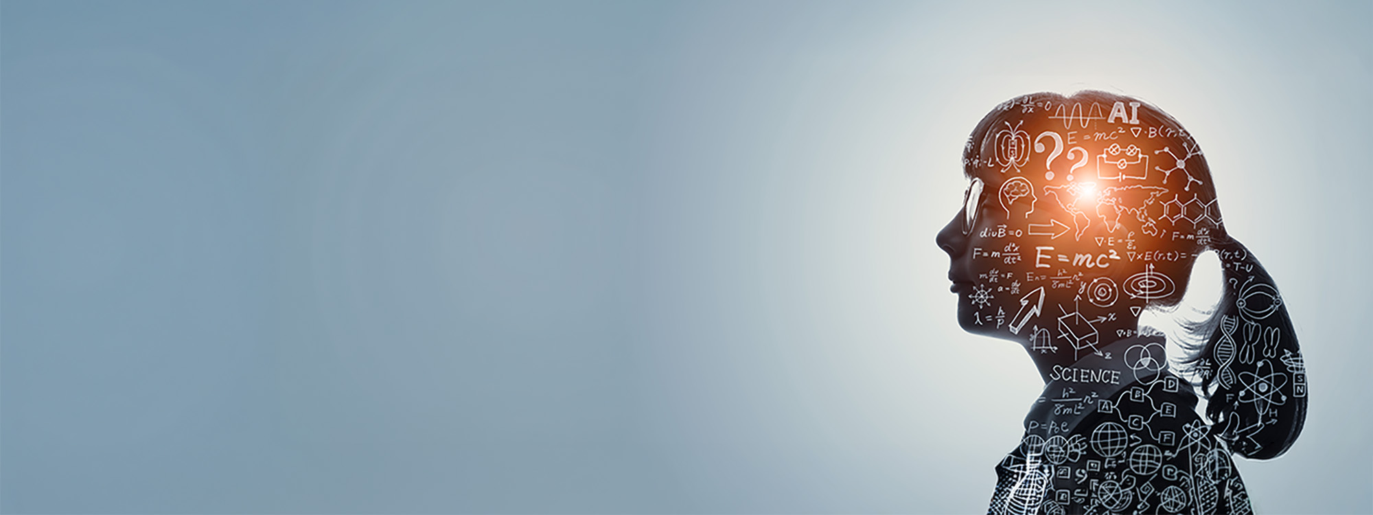 Silhouette of a female with graphics of science and education concepts. 