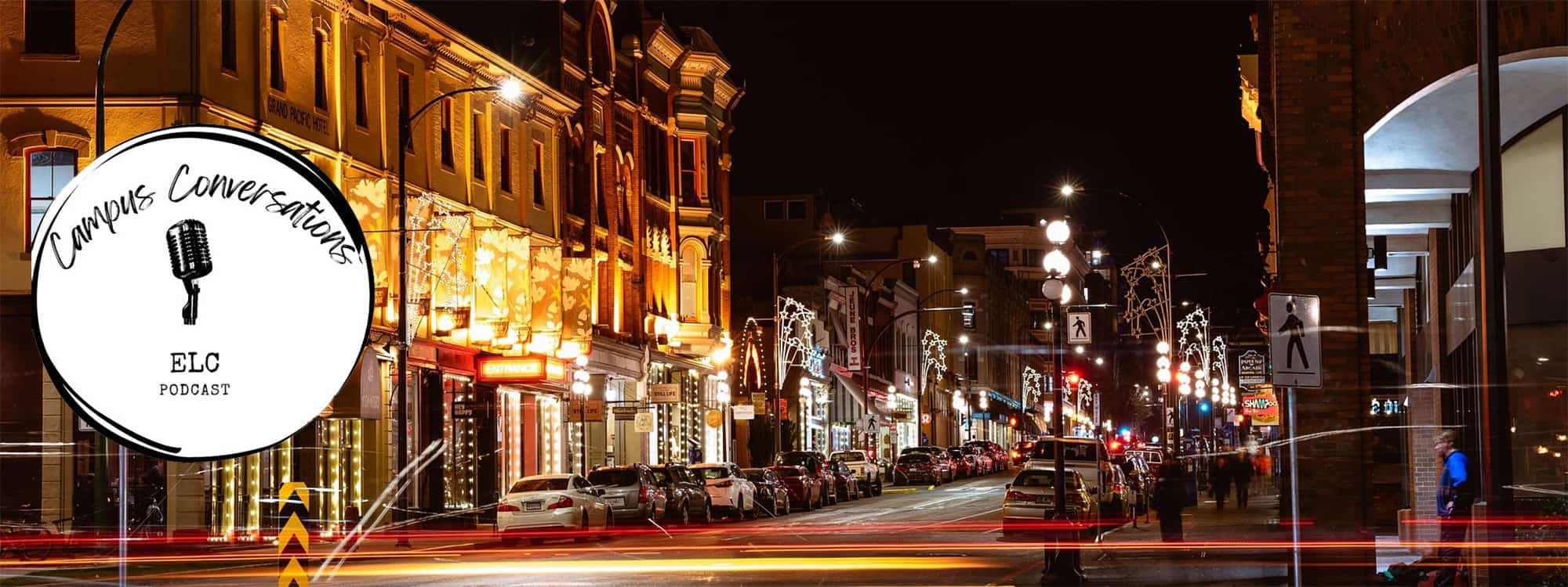 Victoria downtown street at night with Campus Conversations logo overlaid. 