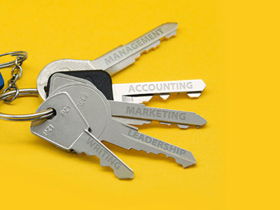 Photo of keys splayed out with a marketing buzzword engraved on each one.