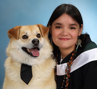 Profile photo of Tiara Opissinow and her dog.