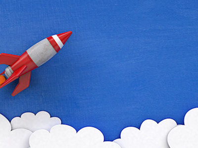 Illustration of rocket launching above the clouds