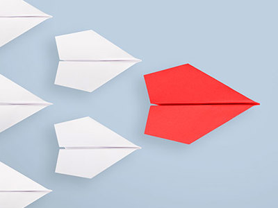 Paper airplanes following a leader