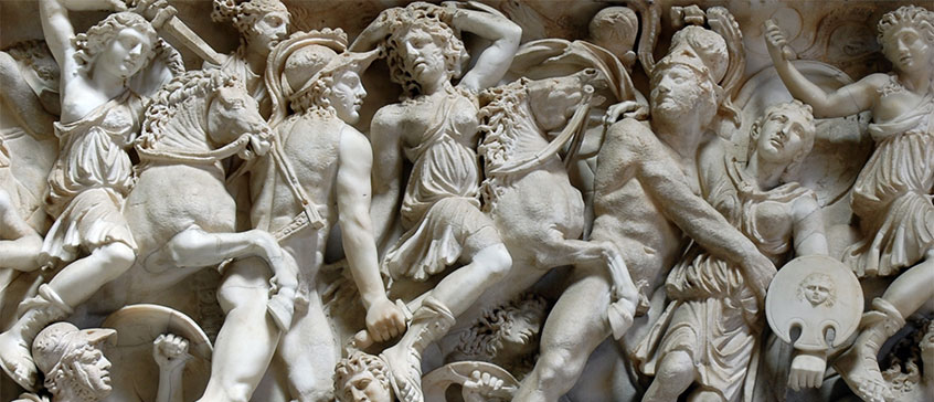 A detailed section of carvings/sculpture depicting a scene of carnage in Rome. Vatican.