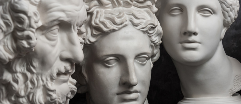 Closeups of the faces of greek statues