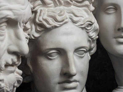 Closeups of the faces of greek statues