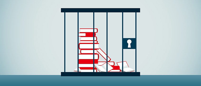 Stylized illustration of a stack of red books behind prison bars, with one book partially opened and pages scattered, and a keyhole visible on the right side of the cage, symbolizing censorship and the restriction of knowledge and ideas.