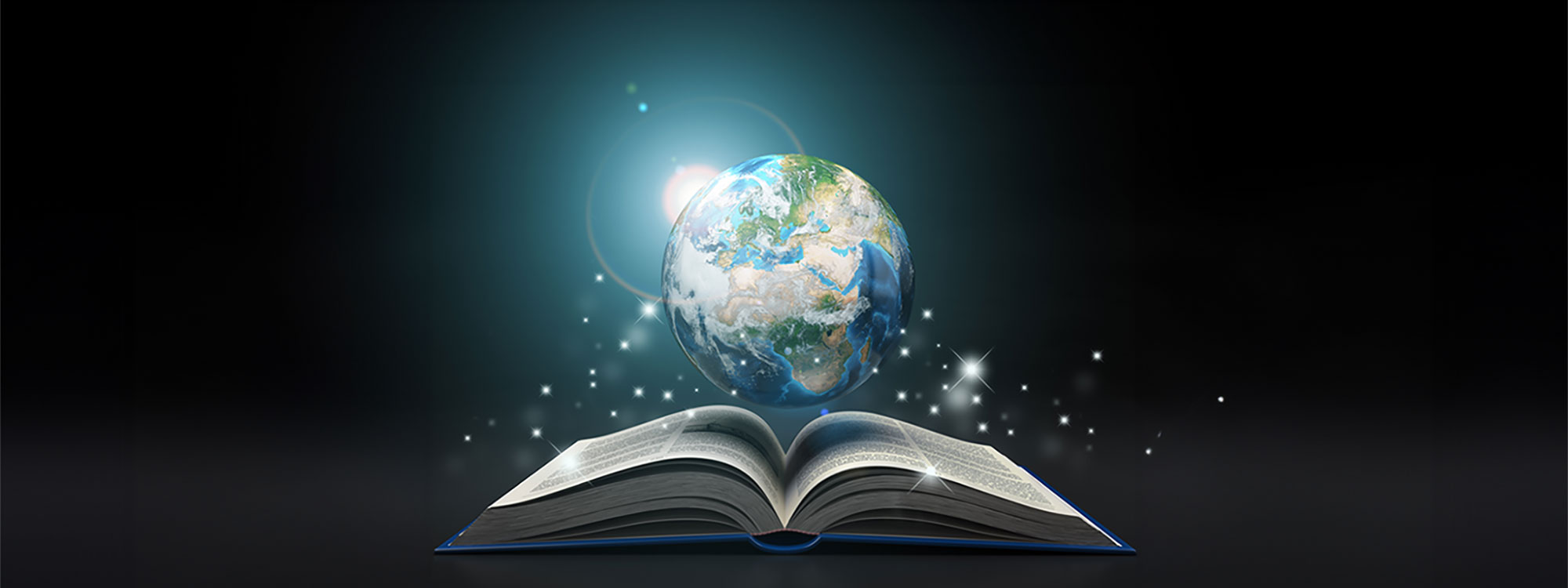 An open book with glowing pages with a globe hovering on top. 