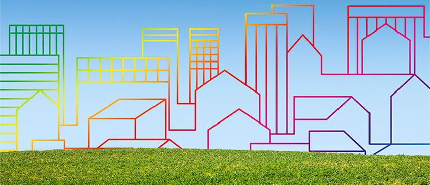 Abstract simplified drawing of outlines of houses on a grass field.