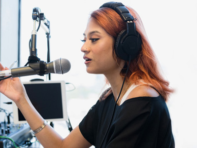 Woman talking on podcast