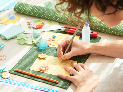 Woman creating a greeting card