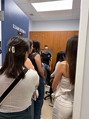 Participants tour healthcare building
