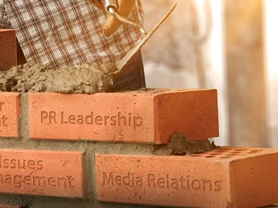 Bricks with the names of PR courses on them. 