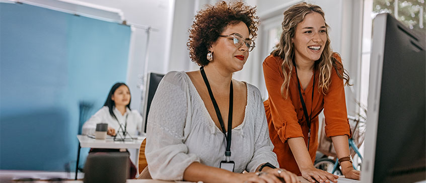Two women at computer