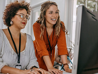 Two women at computer