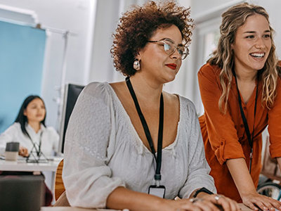 Two women at computer