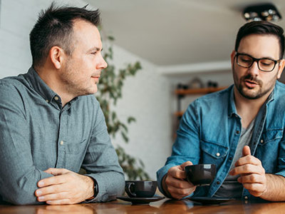 Two men talking about climate change. 