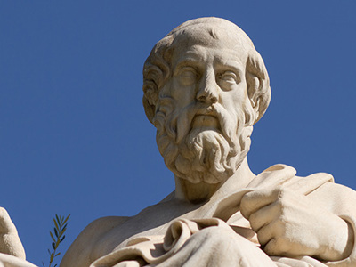 Photo of statue of philosopher. 