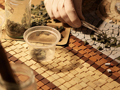 Photo of table packed with artifacts.