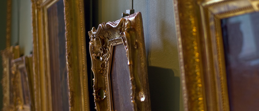 Photo of table packed with artifacts.