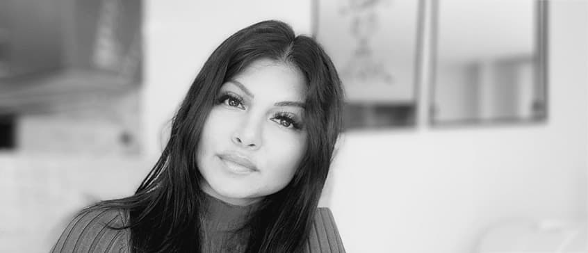 Black and white headshot of Karen Saini