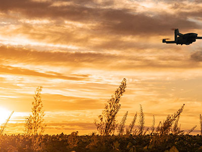 Photo of drone against sunset. 