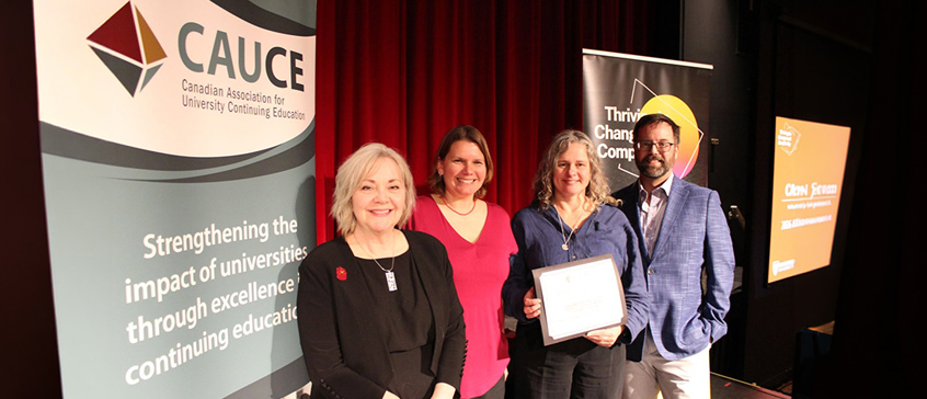 Program representatives accept the CAUCE Program Excellence Gold Award at the 2026 CAUCE Awards in Halifax, Nova Scotia.