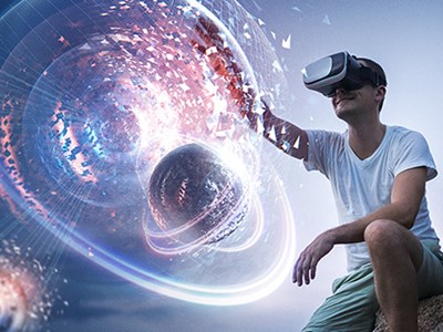 Person with VR headset looking at light spheres.